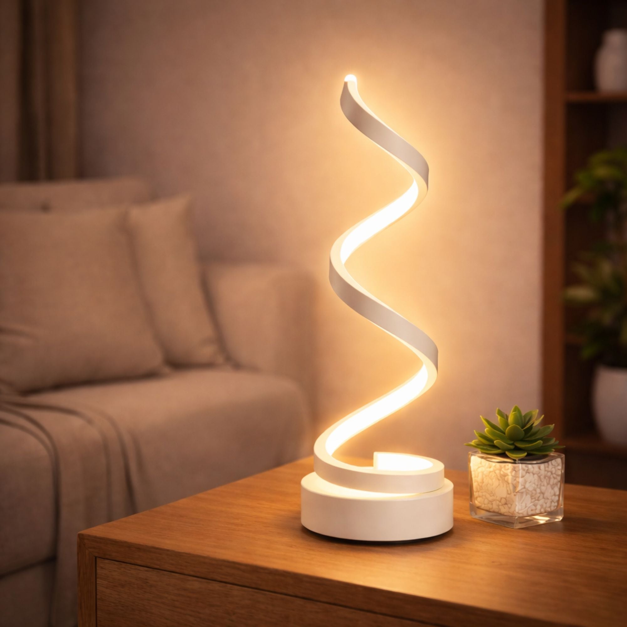Bordslampa i vit modern design med slingrande LED-belysning på bord.