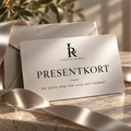 Presentkort från Lamprummet Nordic i exklusiv silverdesign med matchande kuvert och sidenband.