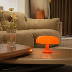 Sladdlös Orange LED bordslampa Ø28 cm som stämningsbelysning på bord och hylla