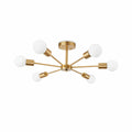 Modern taklampa i mässing med 6 armar och runda glaskupor i nordisk design.