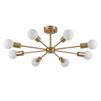 Modern taklampa i mässing med 8 armar och runda glaskupor i nordisk design.