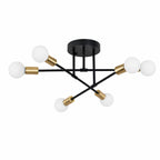 Taklampa i modern svart plafonddesign med 6 vita globlampor och eleganta guldfärgade detaljer i metall på vit bakgrund för stilren och exklusiv belysning.