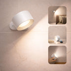 Modern vit vägglampa som är trådlös, portabel och ger varm LED-belysning i hemmet.