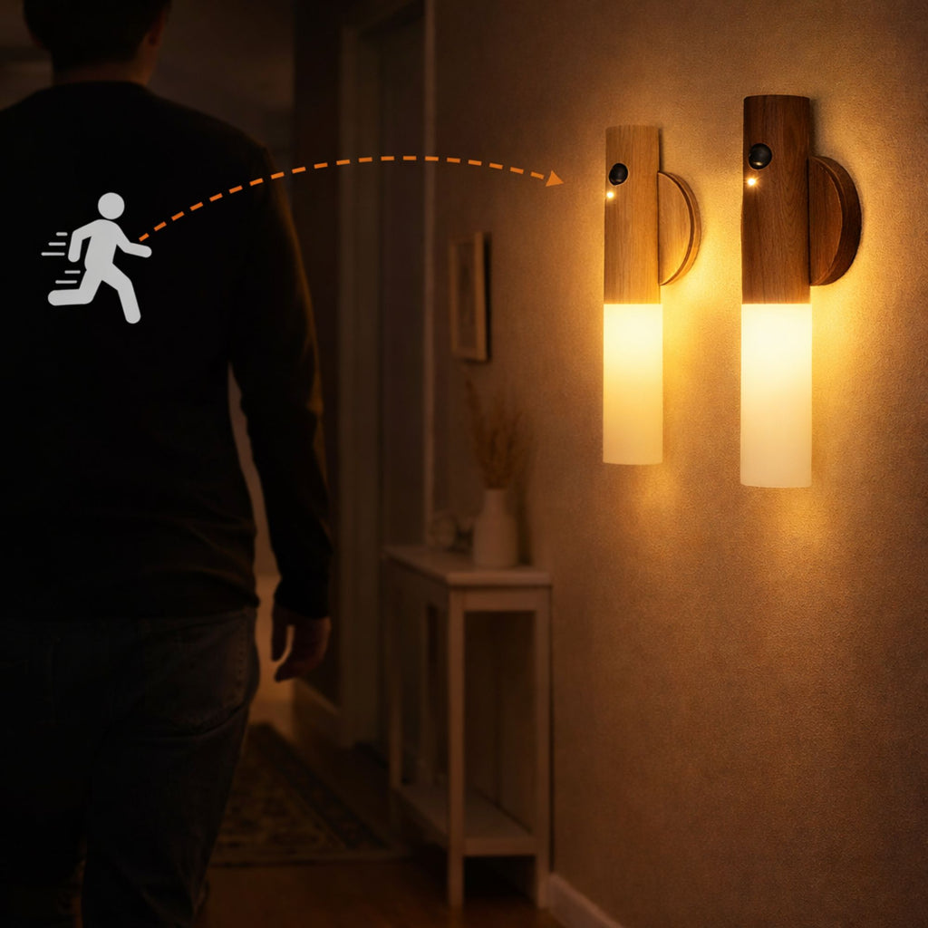 LED vägglampa i trä med rörelsesensor som tänds automatiskt i mörk hall när en person går förbi